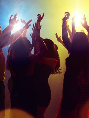 Saddleworth Cricket a group of people at a party with their hands up in the air